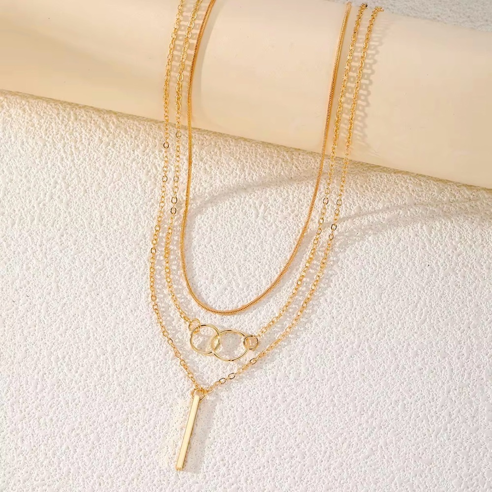 Gold Layered Necklace Set with Three Chains and Pendants - Picture 2 of 4
